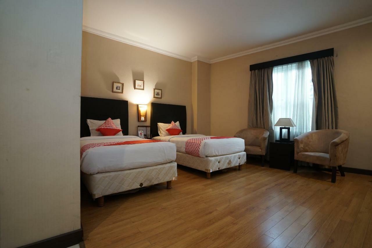 Hotel Capital O 1128 Imara Palembang