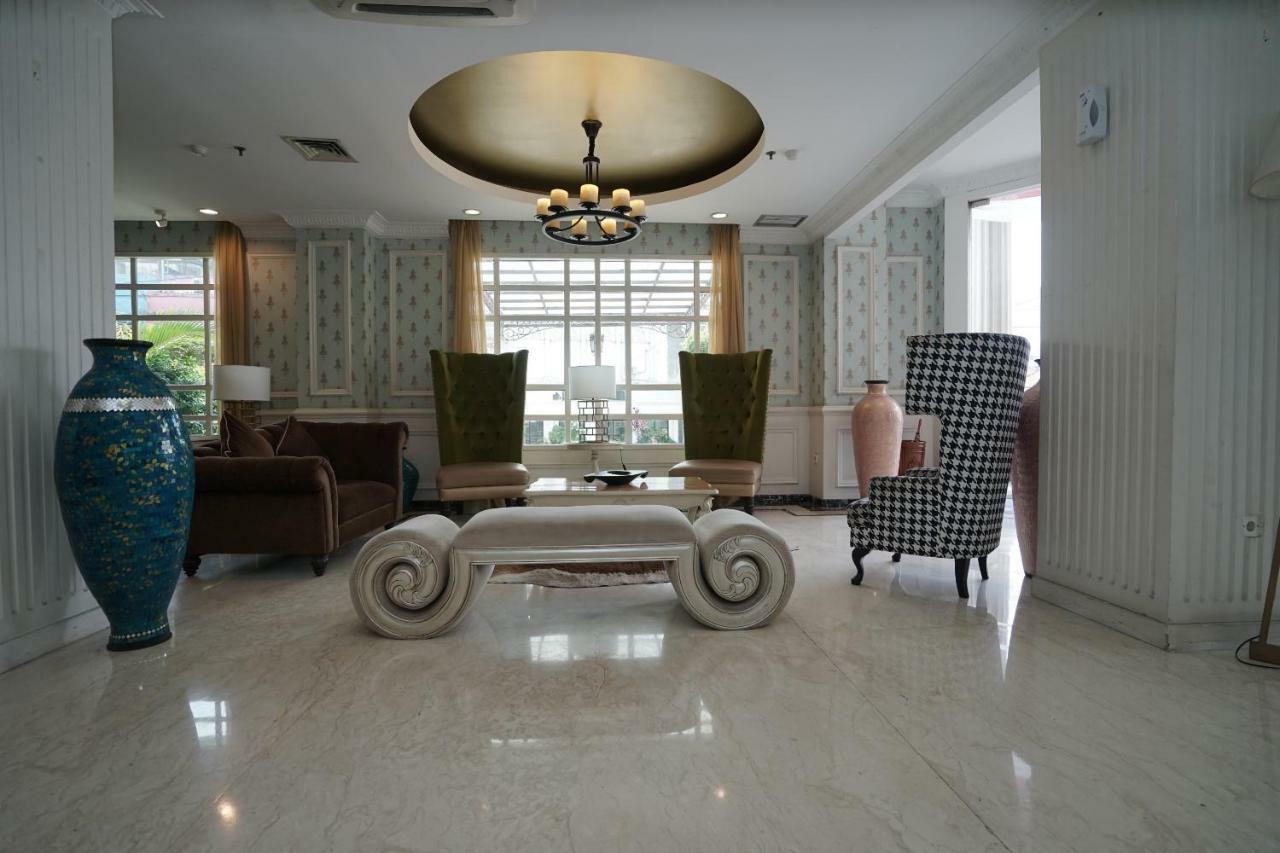Capital O 1128 Imara Palembang
